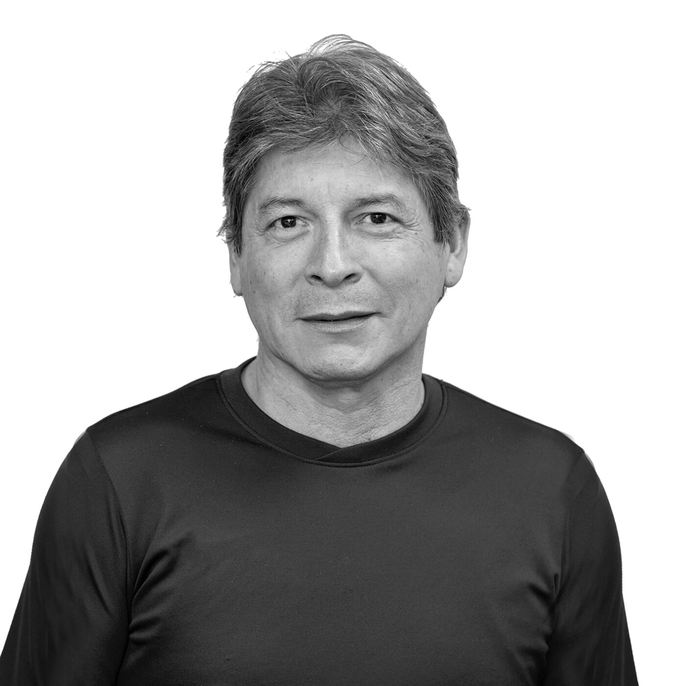 Svartvit bild på Martin Mestanza som är tränare.